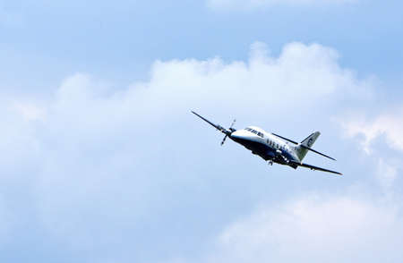 Vintage  British Aerospace Jetstream aircraft in flight blue sky and clouds.のeditorial素材