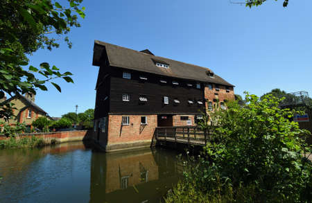 Houghton Mill on the River Ouse on a sunny dayのeditorial素材
