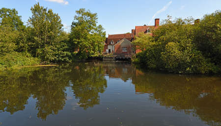 Flatford Mill at Dedham Suffolk with water and treesのeditorial素材