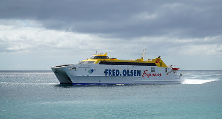 PLAYA BLANCA, LANZAROTE, SPAIN - MARCH 22, 2022:  Fred Olsen Canary Island Ferry Sails Between Playa Blanca Lanzarote and Corralejo Fuerteventura.のeditorial素材