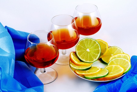 Three glasses of brandy on white background の写真素材
