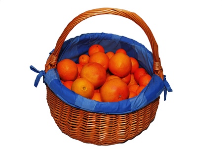 Busket with oranges isolatedの写真素材