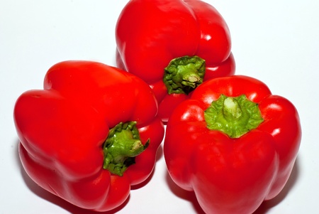 Red peppers on white backgroundの写真素材