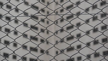 Buildings behind the fencesの写真素材