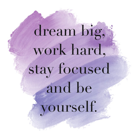 A motivational quote, DREAM BIG, WORK HARD, STAY FOCUSED AND BE YOURSELFâ isolated on purple painting brush background.の写真素材