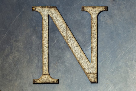 letter N cut in the metal sheet.の写真素材