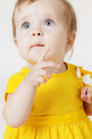 Little girl in the yellow dressの写真素材