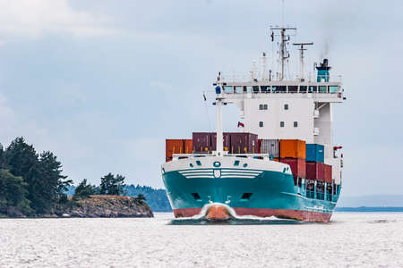 Cargo vessel with containers in the Baltic sea near Helsinkiの写真素材