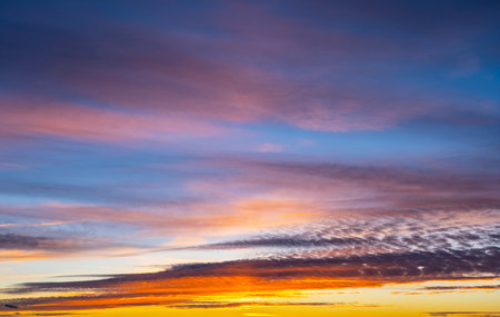dusk with awesome sunset sky from golden hour to blue hour with copy spaceの写真素材