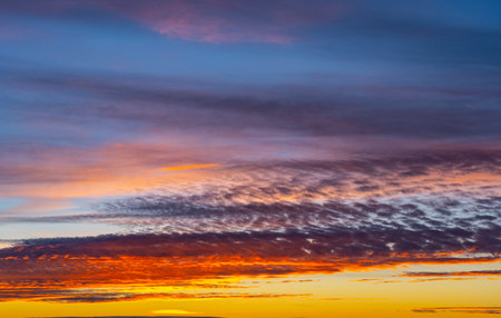 dusk with awesome sunset sky from golden hour to blue hour with copy spaceの写真素材