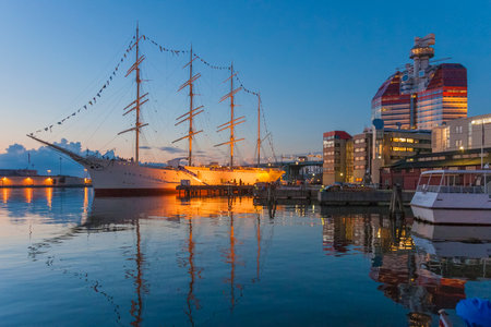 Tradional sailing vessel at sunset in the harbor of Gothenburg, Sweden, Europeのeditorial素材
