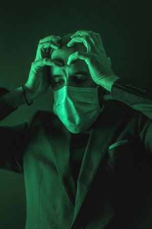 A very frightened sick patient in the coronavirus pandemic, Covid-19の写真素材