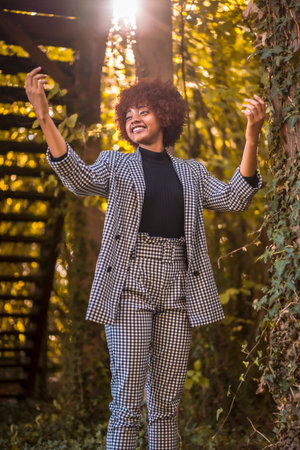 Lifestyle of a young Dominican woman in the middle of nature in autumn