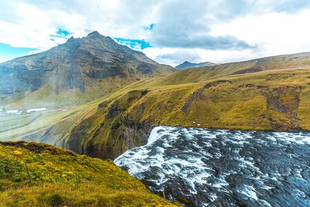 Top of Skogafoss waterfall in the golden circle of south of Icelandの写真素材