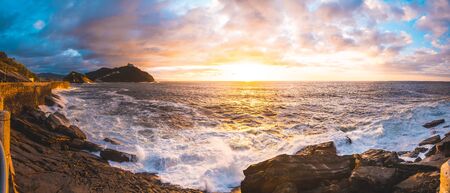 Panoramic of the sunset in the sea of the city of San Sebastián, Gipuzkoa. Basque Countryの写真素材