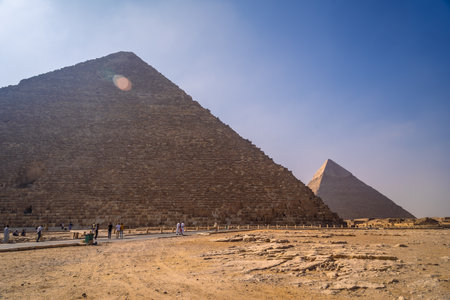 Sunrise at the pyramid of Cheops the largest pyramid. The pyramids of Giza the oldest funerary monument in the world. In the city of Cairo, Egyptのeditorial素材