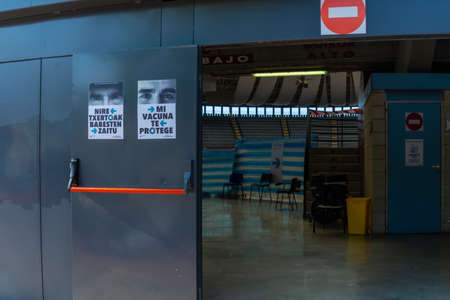 San Sebastian, Gipuzkoa. Spain. May 6, 2021: Access doors to the vaccination center, maximum vaccination of the covid-19 population. Coronavirusのeditorial素材