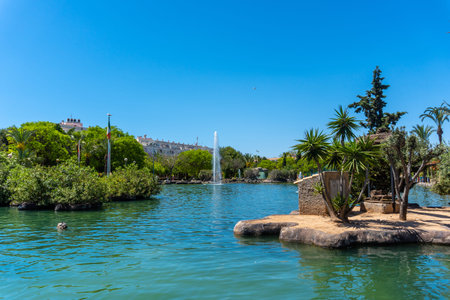 Beautiful lake in the center of the city in the Parque de las Naciones in the town of Torrevieja, Alicante, Mediterranean Sea. Spainの写真素材