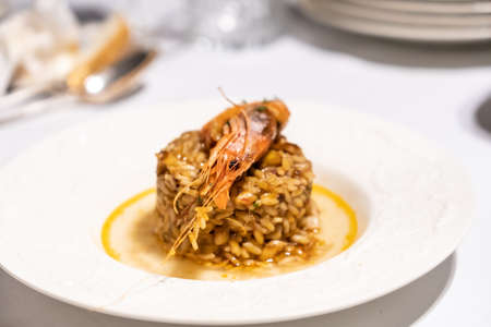 Seafood paellas, traditional Spanish Mediterranean cuisine. Rice with mussels, prawns and squidの写真素材
