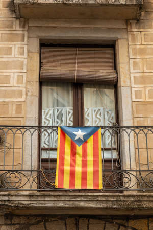 Girona medieval city, yellow elements and ties in solidarity with the political conflict, Catalonia's Costa Brava in the Mediterranean. Spainの写真素材