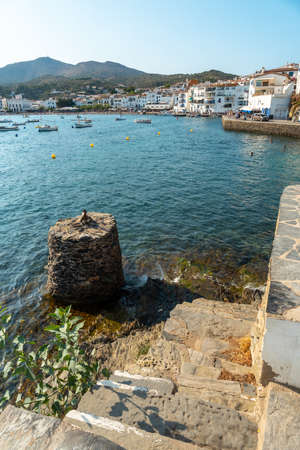 Boats on the beach of the coast of Cadaques, town on the Costa Brava of Catalonia, Gerona, Mediterranean sea. Spainの写真素材