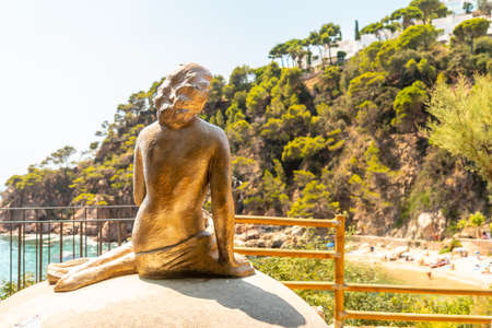 Mermaid sculpture in Cala Canyet next to the town of Tossa de Mar. Girona, Costa Brava in the Mediterraneanのeditorial素材