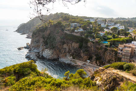 View of the town of Tossa de Mar in summer from the castle, Girona on the Costa Brava of Catalonia in the Mediterraneanのeditorial素材