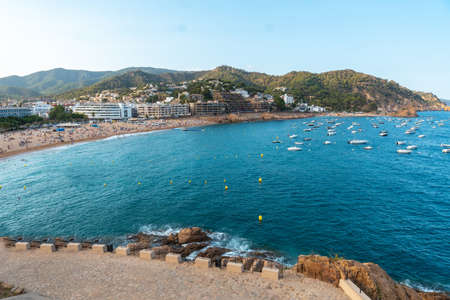 View of the town of Tossa de Mar in summer from the castle, Girona on the Costa Brava of Catalonia in the Mediterraneanのeditorial素材