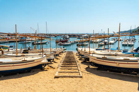 Beach full of boats in Llafranc, Girona on the Costa Brava of Catalonia in the Mediterraneanのeditorial素材