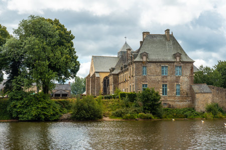 Church of Lake Paimpont in the Broceliande forest, Ille-et-Vilaine department, Brittany, near Rennes. Franceのeditorial素材