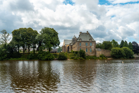 Church of Lake Paimpont in the Broceliande forest, Ille-et-Vilaine department, Brittany, near Rennes. Franceのeditorial素材