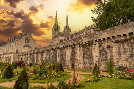 Sunset on the walls of the medieval town of Quimper and the cathedral of Saint Corentin, department of Finisterre. French Brittany, Franceのeditorial素材