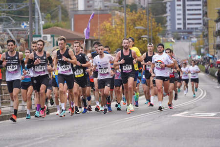San Sebastian, Spain, Gipuzkoa: November 2021: Group of runners in the popular race in the Behobia San Sebastianのeditorial素材