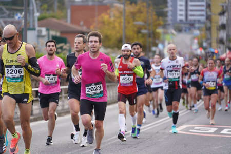 San Sebastian, Spain, Gipuzkoa: November 2021: Group of runners in the popular race in the Behobia San Sebastianのeditorial素材