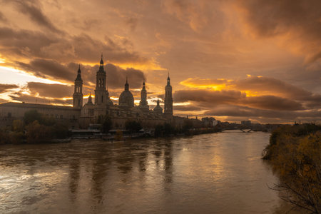 Sunset from the stone bridge next to the Basilica De Nuestra SeÃ±ora del Pilar on the Ebro river...