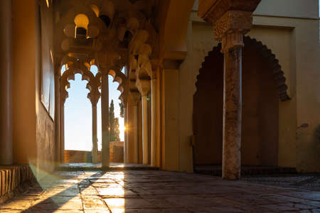 Sunset detail from the Arab doors of a courtyard of the Alcazaba in the city of Malaga, Andalusia. Spain. Medieval fortress in arabic styleのeditorial素材