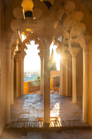 Sunset from the Arab doors of a courtyard of the Alcazaba in the city of Malaga, Andalusia. Spain. Medieval fortress in arabic styleのeditorial素材
