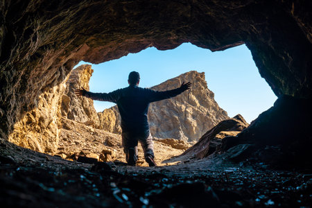 A young tourist in the Almanzora caves, Cala PeÃ±on cut off a virgin and hidden beach in...