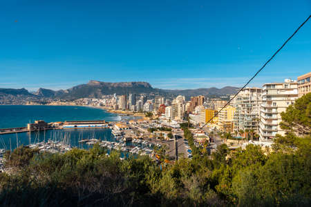 View on the ascent to the PeÃ±Ã³n de Ifach Natural Park in the city of Calpe, Valencia, Valencian Community. Spain. Mediterranean sea. Cantal Roig Beach, La Fossa Beach and Las Salinasの写真素材