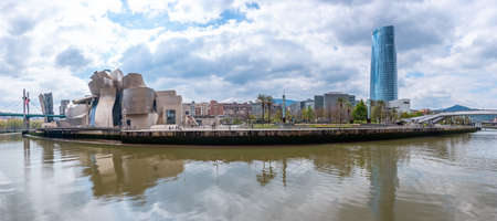 Panoramic view of the Guggenheim museum and the river in the city of Bilbao on a spring morning, Vizcaya. basque countryのeditorial素材