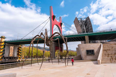 Spider sculpture next to the Guggenheim museum in the city of Bilbao on a spring morning, Vizcaya. basque countryのeditorial素材