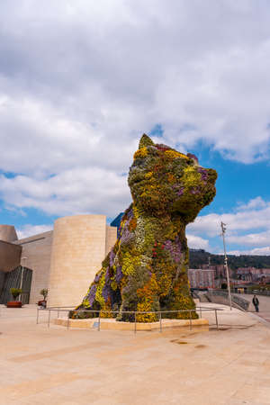 Flower dog called Puppy next to the Guggenheim museum in the city of Bilbao in spring, Vizcaya. basque countryのeditorial素材