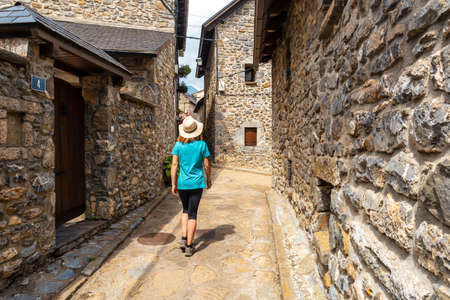 A tourist visiting Piedrafita de Jaca, municipality of Biescas, in Alto Gallego, Huesca, Spainの写真素材