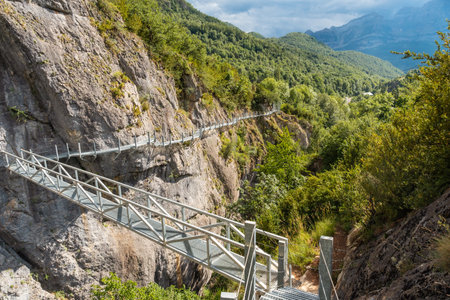 Footpath of the metal footbridge in the mountain in the town of Panticosa in the Pyrenees, Huescaの写真素材