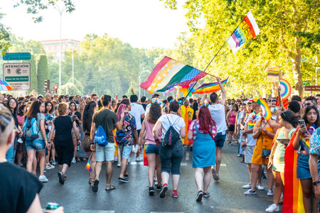 Madrid, Spain: July 9, 2022: Multiple pride flag and rainbow in the party of the gay pride parade,...
