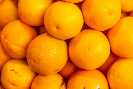 Orange fruit at the Farmers Market in the Madeira city of Funchal. Portugalの写真素材