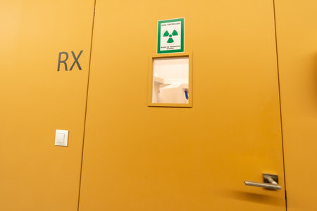 Corridor of a dental clinic with multiple boxes and the x-ray roomの写真素材