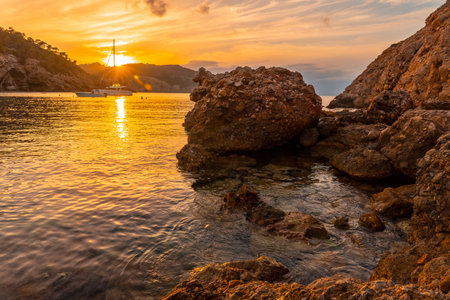 Sunset on the beach at Benirras sunset in Ibiza. holiday conceptの写真素材
