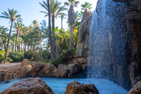 Beautiful waterfall in the El Palmeral park in the city of Alicanteの写真素材