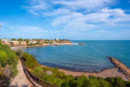 View of the Caleta beach in the tourist town of Cabo Roig. Alicanteの写真素材